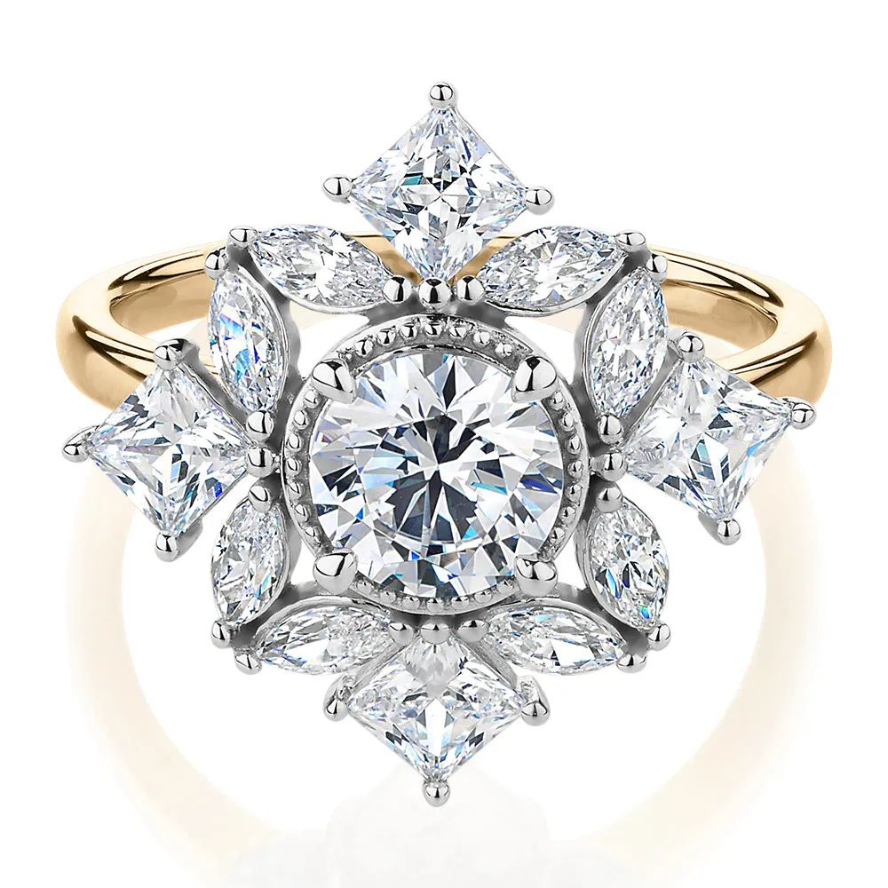 Dress ring with 2.99 carats* of diamond simulants in 10 carat yellow and white gold